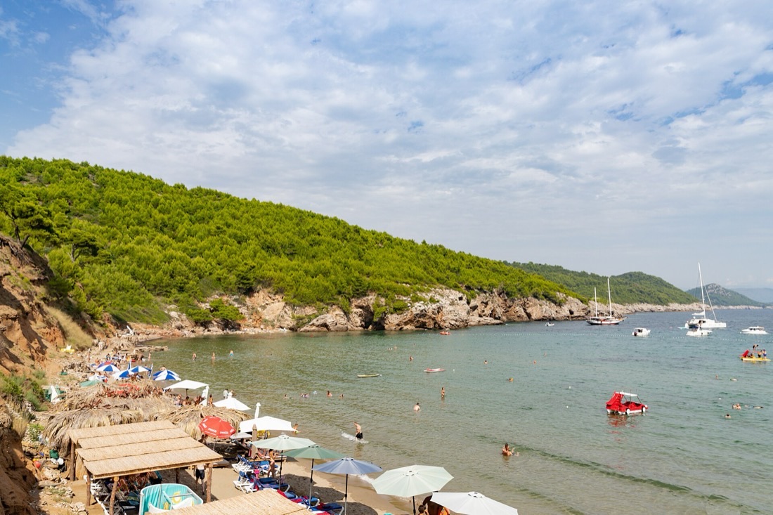 The quiet harbour and green hills of Šipan island